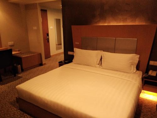 Katil atau katil-katil dalam bilik di Kinabalu Daya Hotel