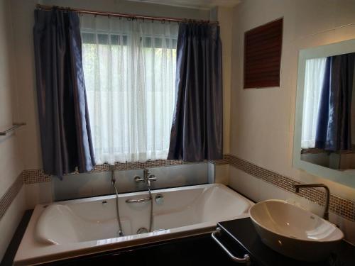 Hotel De Wualaiにあるバスルーム