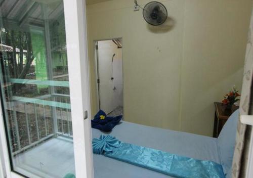 a room with a view of a bathroom with a window at Koh Phayam Greentawan Resort in Ko Phayam
