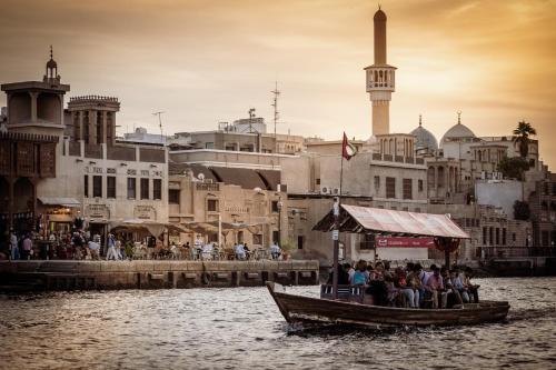 a group of people on a boat in the water at MAZMI CASA in Dubai