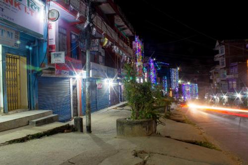 a city street at night with street lights at Gorkha Chhen bed & breakfast in Gorkhā