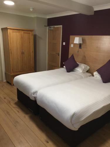 Una cama o camas en una habitación de Hotel Celebrity Bournemouth East Cliff by Villare hotels