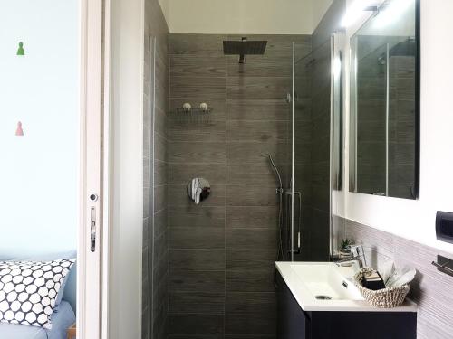 a bathroom with a shower and a sink at B&B Musica e Mare in Naples