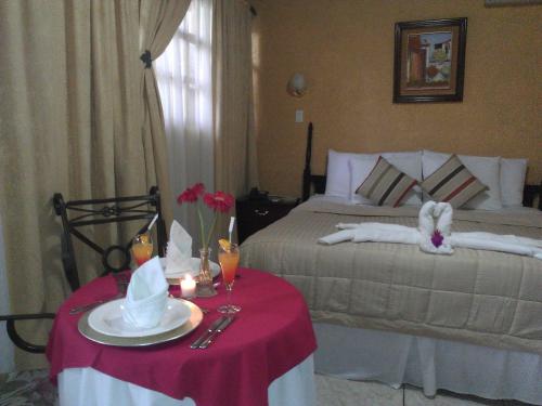 Postel nebo postele na pokoji v ubytování Hotel Cafe