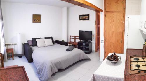 Postel nebo postele na pokoji v ubytování EVA & TRAVEL - Cal Marcel Prades