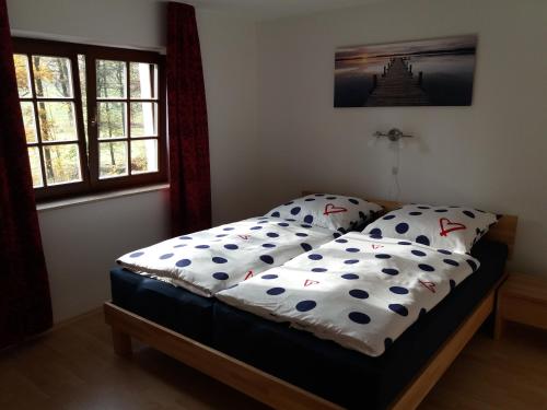 Postel nebo postele na pokoji v ubytování Ferienwohnung Wolf