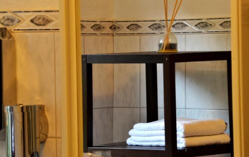 Koupelna v ubytování Hotel Athos