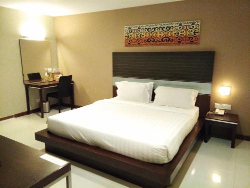 Katil atau katil-katil dalam bilik di Kinabalu Daya Hotel