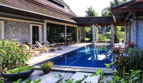 an image of a villa with a swimming pool at Sabai Private Pool Villa Khao Lak in Khao Lak
