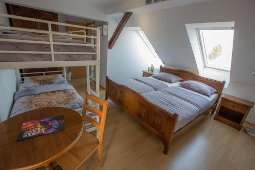 Postel nebo postele na pokoji v ubytování Hostel Sonce