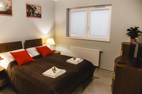 Posteľ alebo postele v izbe v ubytovaní ULMA apartment