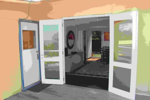 an image of an open door in a room at Brandis Beach House in Guilderton