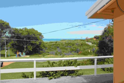 a view from the balcony of a house at Brandis Beach House in Guilderton