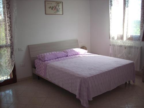 Postel nebo postele na pokoji v ubytování B&B Da Toni