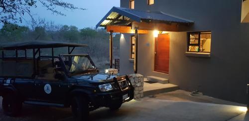 Ένα ή περισσότερα κρεβάτια σε δωμάτιο στο Sweni Lodge 91 Mjejane Kruger Park