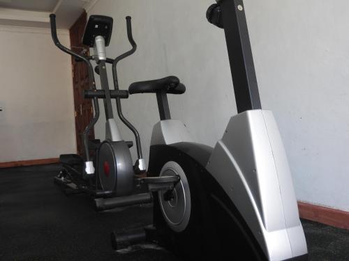 Gimnasio o instalaciones de fitness de Omega Gardens Hotel