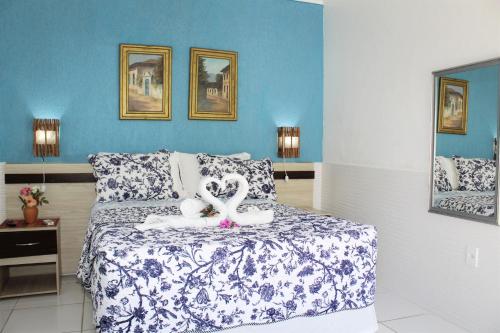 Cama ou camas em um quarto em Porto Bahia Hotel