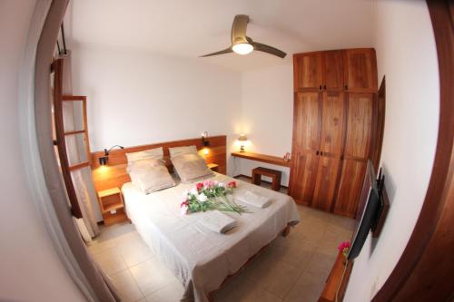 Una cama o camas en una habitación de Hotel Casa Evora - luxury and beach front