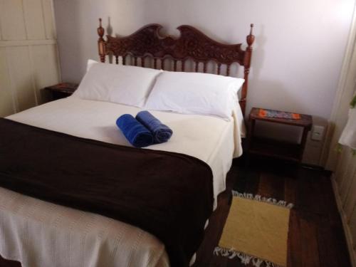 Una cama o camas en una habitación de Casa na Praia do Matadeiro