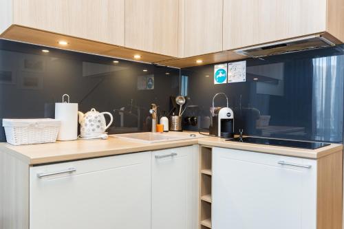 Una cocina o zona de cocina en Angleterre Apartments