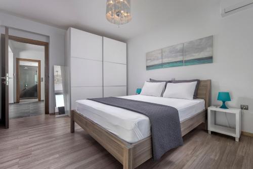 Postel nebo postele na pokoji v ubytování Villa Evian