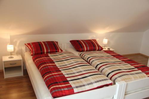 Postel nebo postele na pokoji v ubytování Boardinghouse Frank