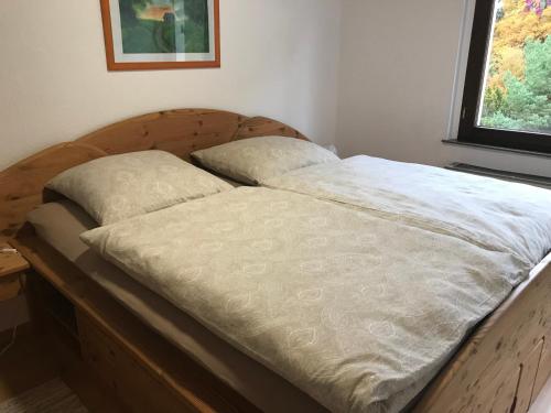 Ένα ή περισσότερα κρεβάτια σε δωμάτιο στο Ferienhaus Lara