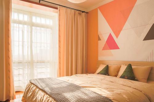 a bedroom with a bed and a large window at Henan Kaifeng·Gulou Square· Locals Apartment 00138460 in Kaifeng