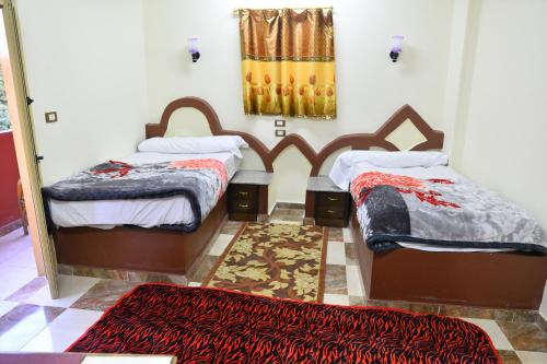 Ένα ή περισσότερα κρεβάτια σε δωμάτιο στο El Prince Guesthouse