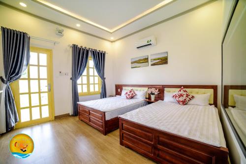 Een bed of bedden in een kamer bij Phan rang kite center