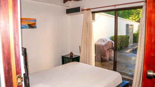 Postel nebo postele na pokoji v ubytování CWC Casa Wasabi 1bedroom 1bathroom