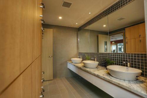 Koupelna v ubytování Citadines Central Binh Duong