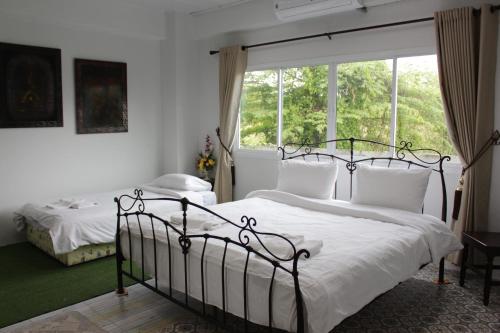Voodi või voodid majutusasutuse Moeimanee Resort toas
