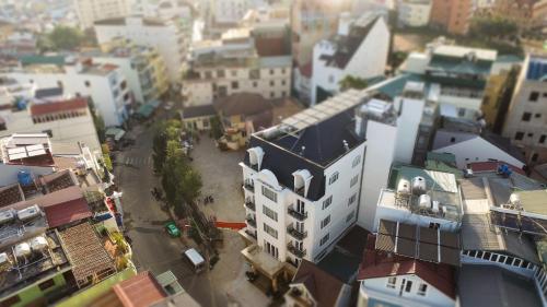 an aerial view of a city with buildings at Roy Dala Hotel in Da Lat