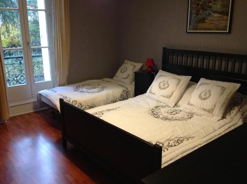 Postel nebo postele na pokoji v ubytování Le Rubis de Chanterive