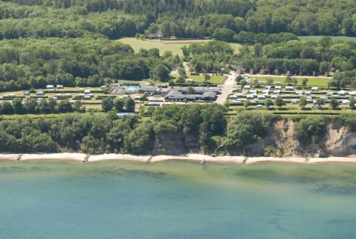 an aerial view of a resort on a beach at Dancamps Trelde Naes (Camp Site) in Fredericia