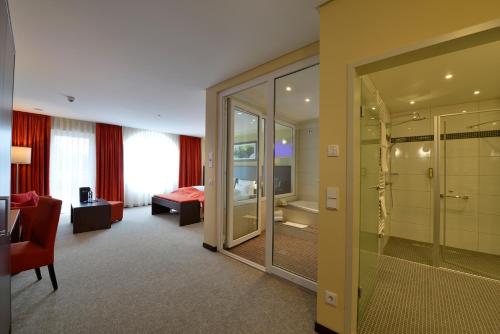 Koupelna v ubytování Aribo Hotel