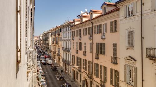 a view of a city street with buildings at Palazzo Del Carretto-Art Apartments and Guesthouse in Turin