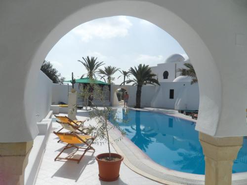 a view of the pool from the courtyard of a villa at Maison Leila chambres d hotes in Midoun