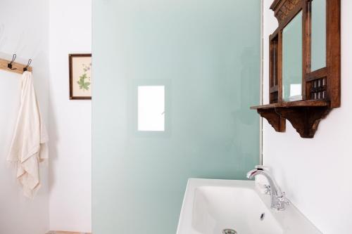 Ванная комната в Noguera Casa Rural Casa de Poble