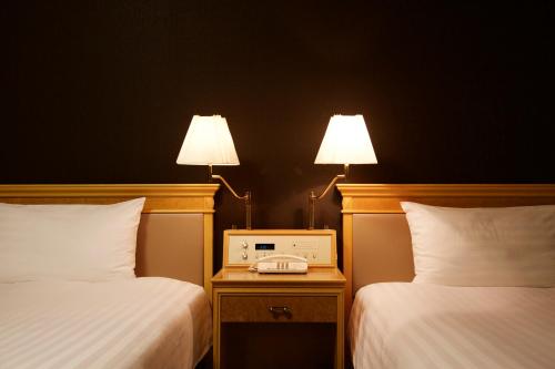 Cama o camas de una habitación en Hotel Agora Regency Osaka Sakai