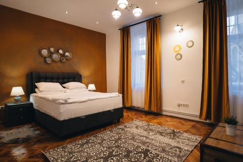 Katil atau katil-katil dalam bilik di Apartament Piata Mica
