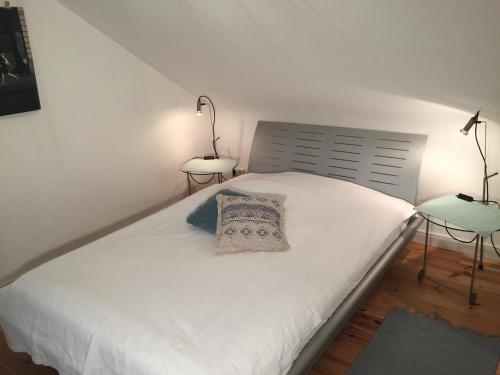 Кровать или кровати в номере Fabrikantenvilla