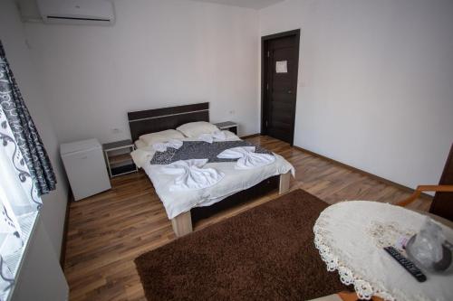 Ένα ή περισσότερα κρεβάτια σε δωμάτιο στο Casa Alex