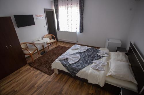 Ένα ή περισσότερα κρεβάτια σε δωμάτιο στο Casa Alex