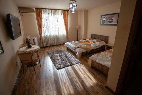 Ένα ή περισσότερα κρεβάτια σε δωμάτιο στο Casa Alex