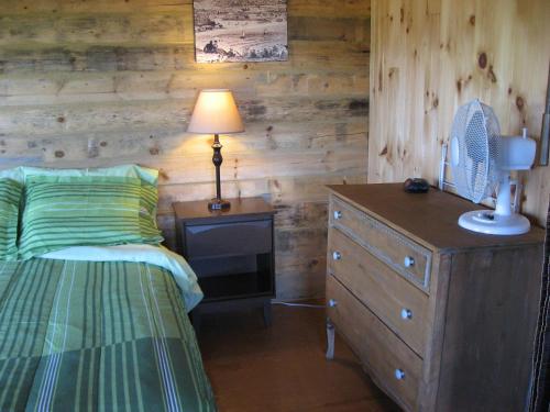 Een bed of bedden in een kamer bij Chalet de la Montagne