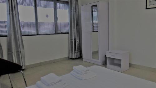 Ibiz Tourist Residence 2にあるベッド
