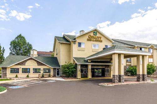 a front view of a hotel with a parking lot at Quality Inn & Suites Westminster - Broomfield in Westminster