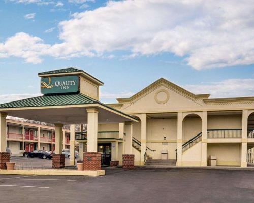 a building with a sign on top of it at Quality Inn Takoma Park in Takoma Park